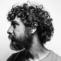 Man with Curly Hair and Beard Man with Curly Hair and Beard